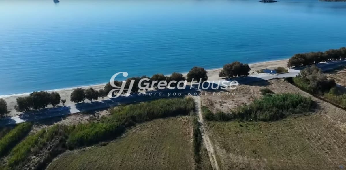 Investment Opportunity in Karystos - Beachfront Land for Sale for Hotel Development - Photo 1