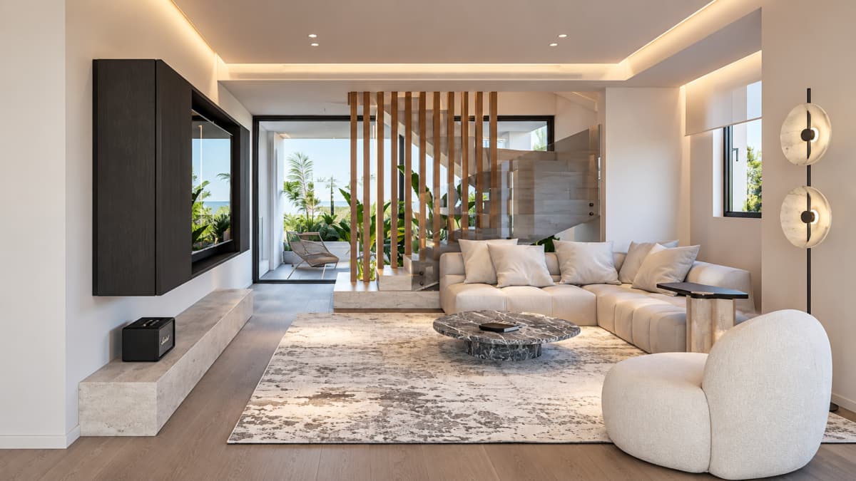A modern living room with a large light sectional sofa, marble coffee table, white armchair, and wooden stair slats.