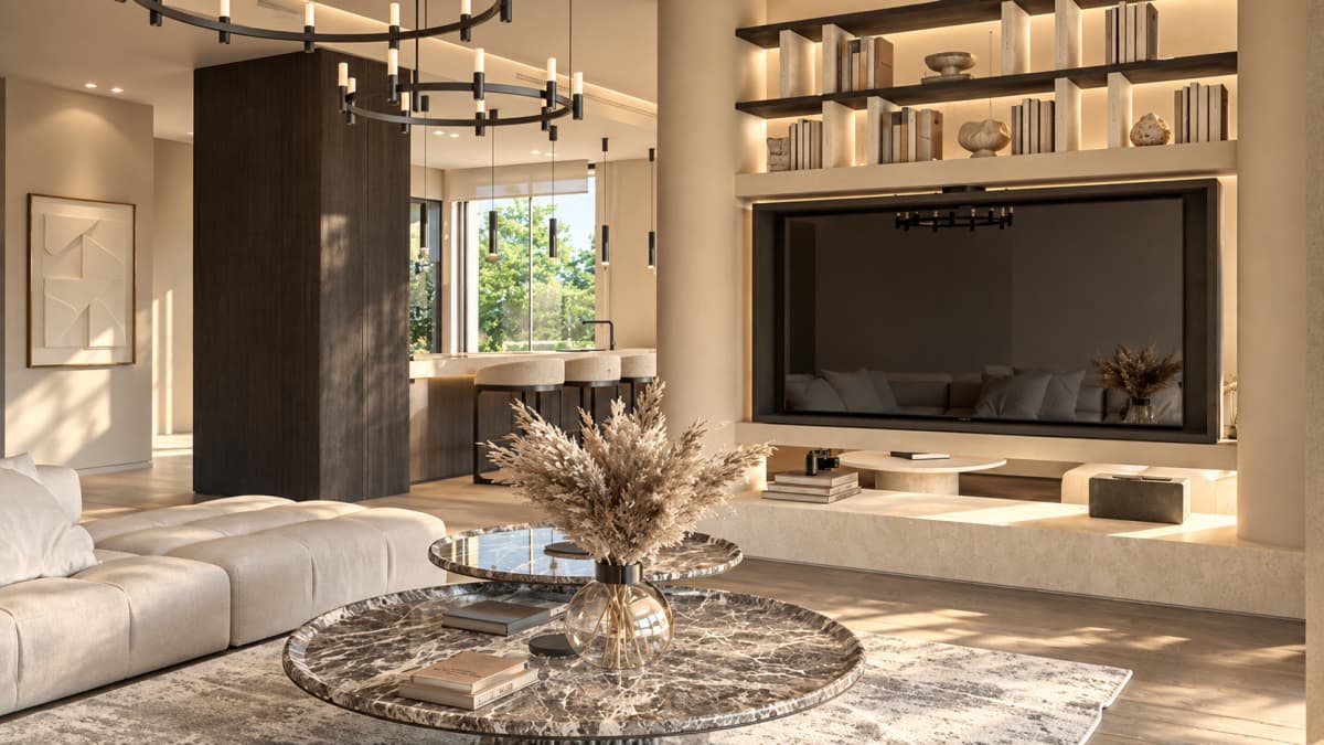 A modern living room with a built-in TV unit, marble coffee tables, and a view into the kitchen.