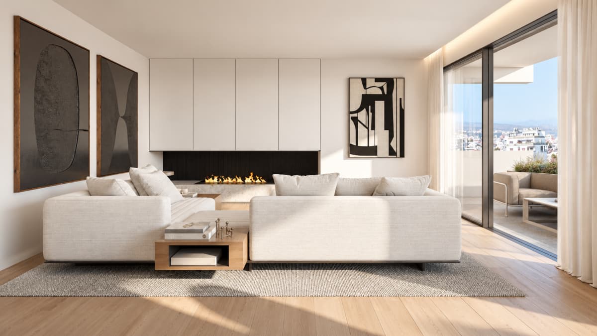 A modern living room featuring a light-colored sectional sofa, a linear fireplace set into a white cabinetry wall, and sliding glass doors opening to an exterior balcony.